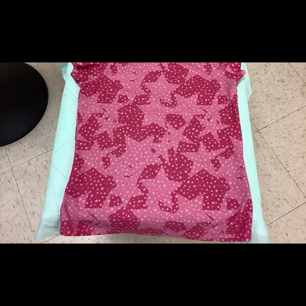 Young girls(9-10 yrs. old) size 7/8 pink top.